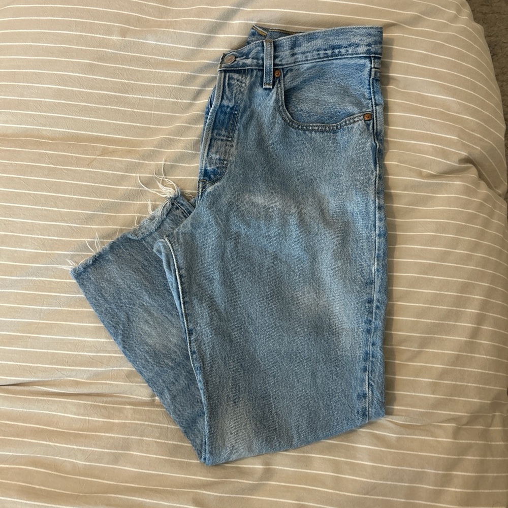 Levi’s 501 distressed cropped jeans